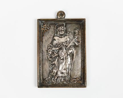 Plaque en bronze avec restes d'argenture représent