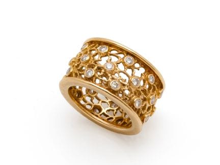Bague bandeau en or 750 millièmes ajouré à décor d