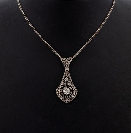 Diamond-necklace , YG 585/000 and silver tested, a