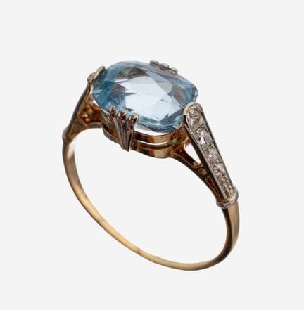 Anillo de oro de 14 quilates con aguamarina y diam