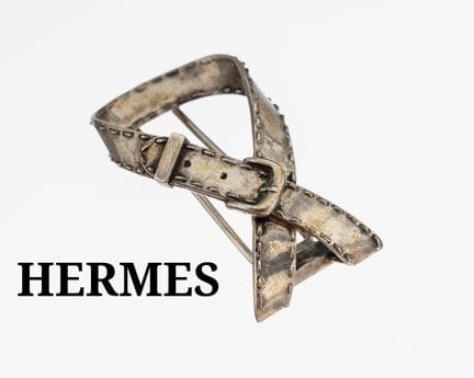HERMES brooch , silver, presentation of a belt, l.