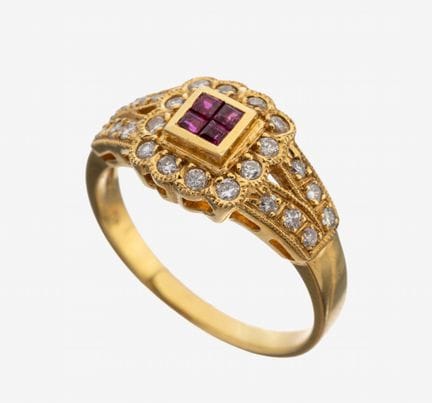 Anillo de oro de 18 quilates con rubíes y brillant