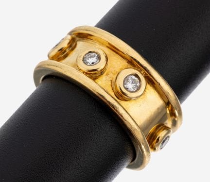 Bague en or 18 carats sertie de diamants, poinçon 