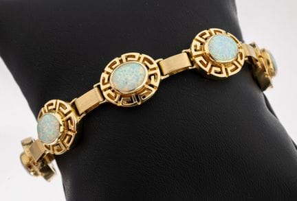 Bracelet en or 14 carats avec pierres de couleur, 