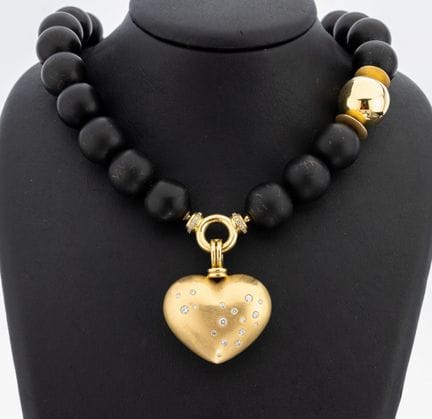 Collier original en or 18 carats serti de brillant