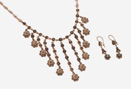 Parure de bijoux en or 9 carats sertie de diamants