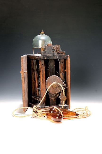 Reloj de ruedas de madera con accionamiento por cu