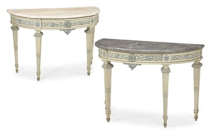 A PAIR OF CONTINENTAL CARVED AND PAINTED CONSOLE T