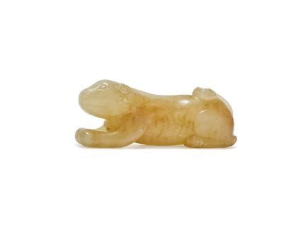 Eine chinesische Figur eines Hundes aus Seladon un