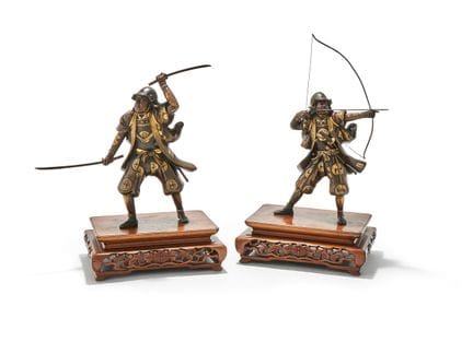 An attractive pair of Japanese parcel gilt bronze 