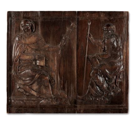 Relief en bois sculpté représentant les saints Gré