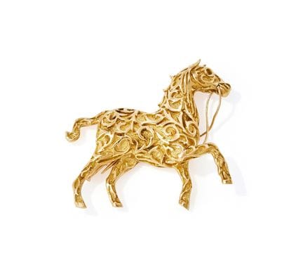 BOUCHERON, BROCHE DE ORO DE 18 QUILATES CON FORMA 