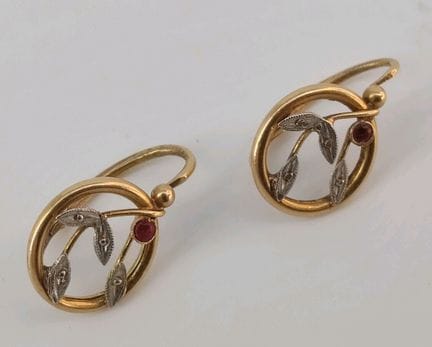 Pair of 18k yellow gold (750) round earrings with 