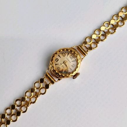 CHARMA - Montre de dame en or jaune 18k (750 milli