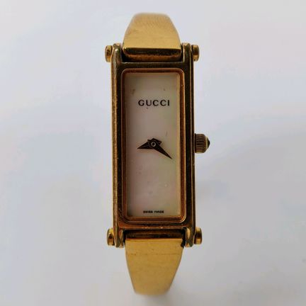 GUCCI montre femme modèle Horsebit en métal doré é