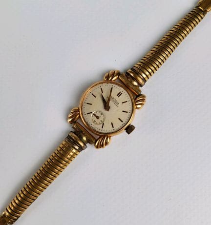 Montre en or jaune 18K (750 millièmes), Bracelet a