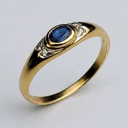 18K yellow gold ring (750 parts per thousand) set 
