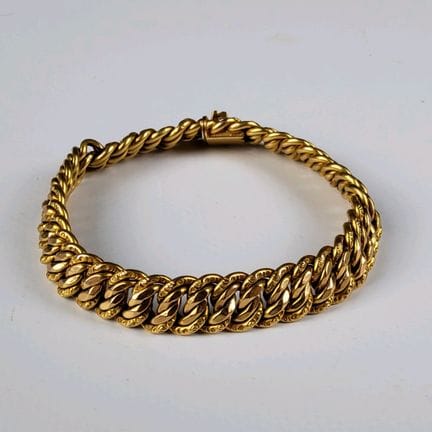 18K yellow gold (750) bracelet with an American li