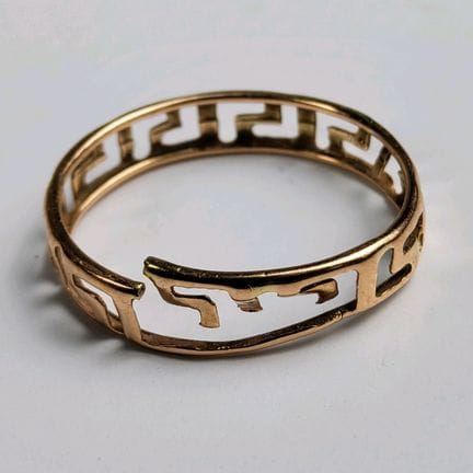 14K yellow gold scrap (585 parts per thousand).
Gr