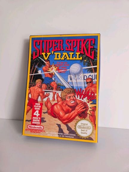 任天堂 - NES。游戏：《超级排球》。含原装盒、说明书和卡带。法语版。品相极佳。发行年份：1990