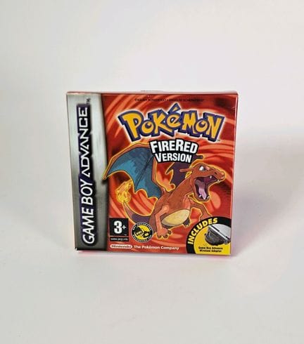 任天堂 - GBA。游戏：《宝可梦 火红版》。套装极为齐全，含包装盒、说明书、游戏卡带及适配器。PA