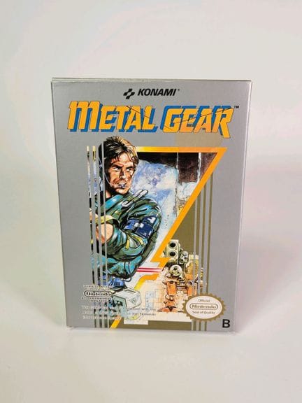 任天堂 - NES。游戏：《合金装备》。含游戏盒、卡带、说明书和卡片。PAL EEC版本。发行年份：