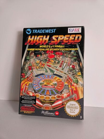 任天堂 - NES。游戏：《High Speed》。套装包含游戏盒、说明书、固定卡和游戏卡带。法语版