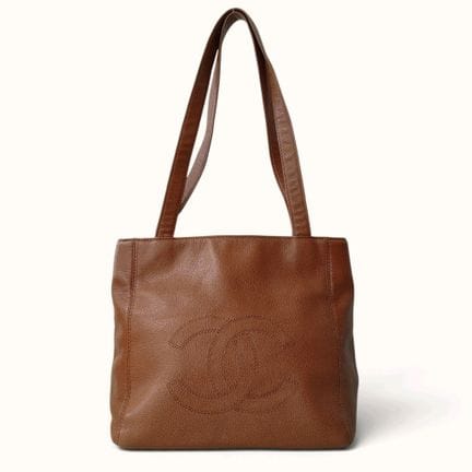 CHANEL. Borsa shopping in pelle martellata color f