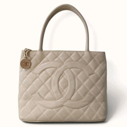 CHANEL. Borsa shopping "Medaillon" in pelle di vit