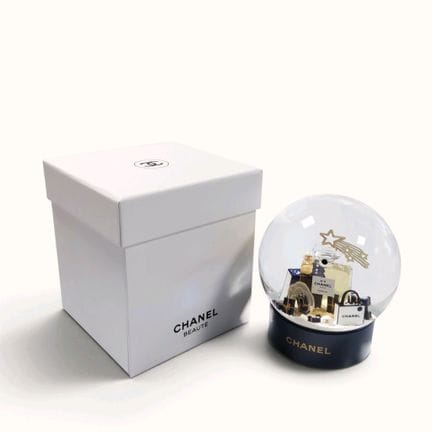 CHANEL. Snow globe featuring a Chanel N°5 perfume 