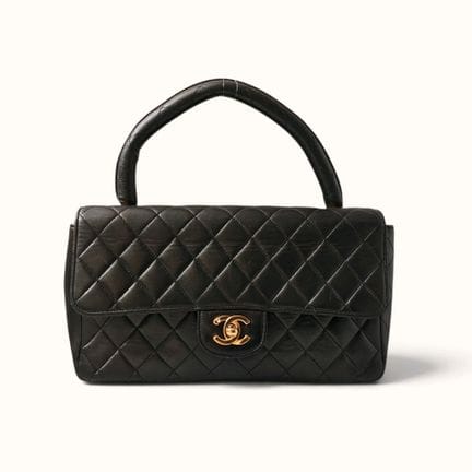 CHANEL. Borsa a mano in agnello trapuntato nero, f