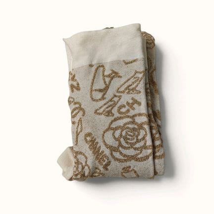 CHANEL. Paio di collant "Egypt" beige con decorazi