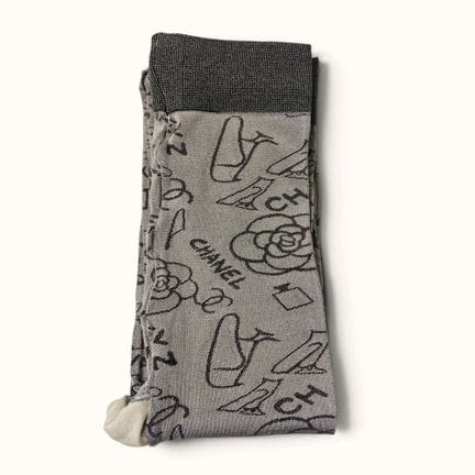 CHANEL. Pair of gray "Egypt" tights; size not indi