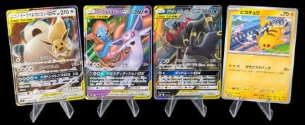 Set di 4 carte Pokémon - Di cui 3 GX Squadra e una