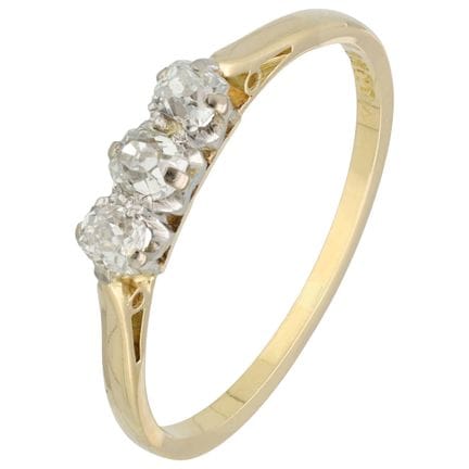Ring aus 18 Karat Gelbgold mit drei Diamanten
Bese