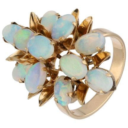 10K-Ringset mit Opalen
Gelbfarbenes Ringset mit 11