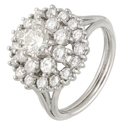 Anello a grappolo in platino con diamanti
Imprezio