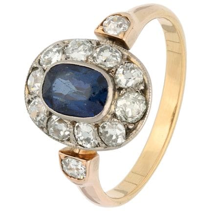 Anello a grappolo 12K con zaffiro e diamanti
Anell