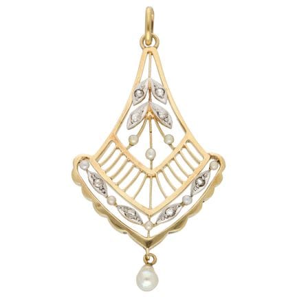 Pendentif en or jaune 14 carats serti de perles et
