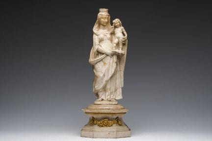 A Flemish carved alabaster 'Madonna and Child' gro