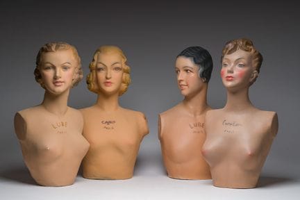 Four French polychrome painted plaster female mann