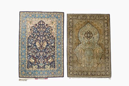 Un tapis persan d'Ispahan, signé, en laine sur soi