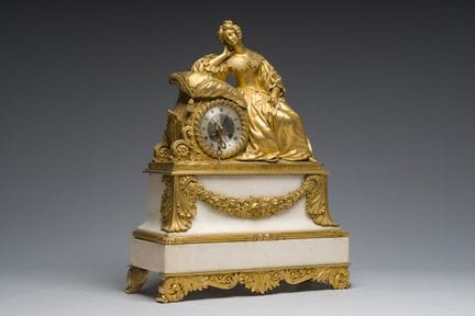 Horloge de cheminée française en bronze doré et ma