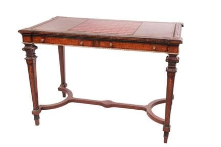 Gillow & Co: a late 19th-century walnut games tabl
