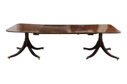 A Victorian mahogany two-pillar dining table, with