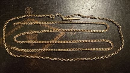 2 Kettenstücke aus Gelbgold (18 K) und ein Schlüss