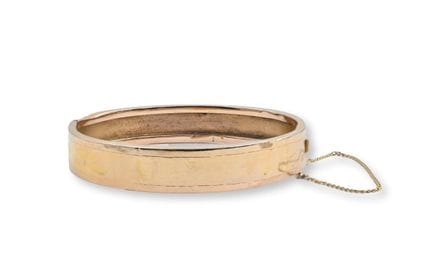 Pulsera rígida de oro amarillo de 18 quilates con 