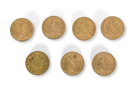 Siete monedas de 20 F en oro
Napoleón III con la c