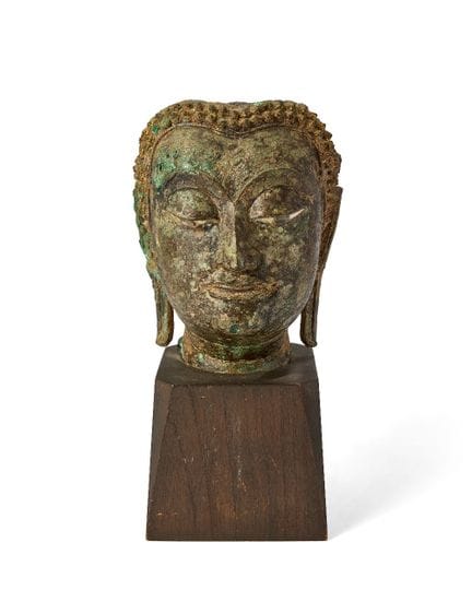 Fragment d'une tête de Bouddha en bronze doré de S