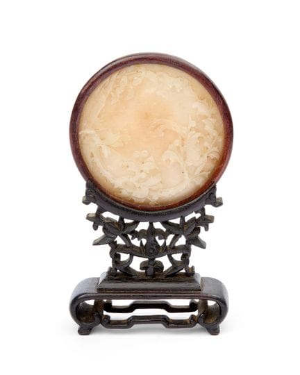 Plaque circulaire en jade blanc crème de Chine

Dy
